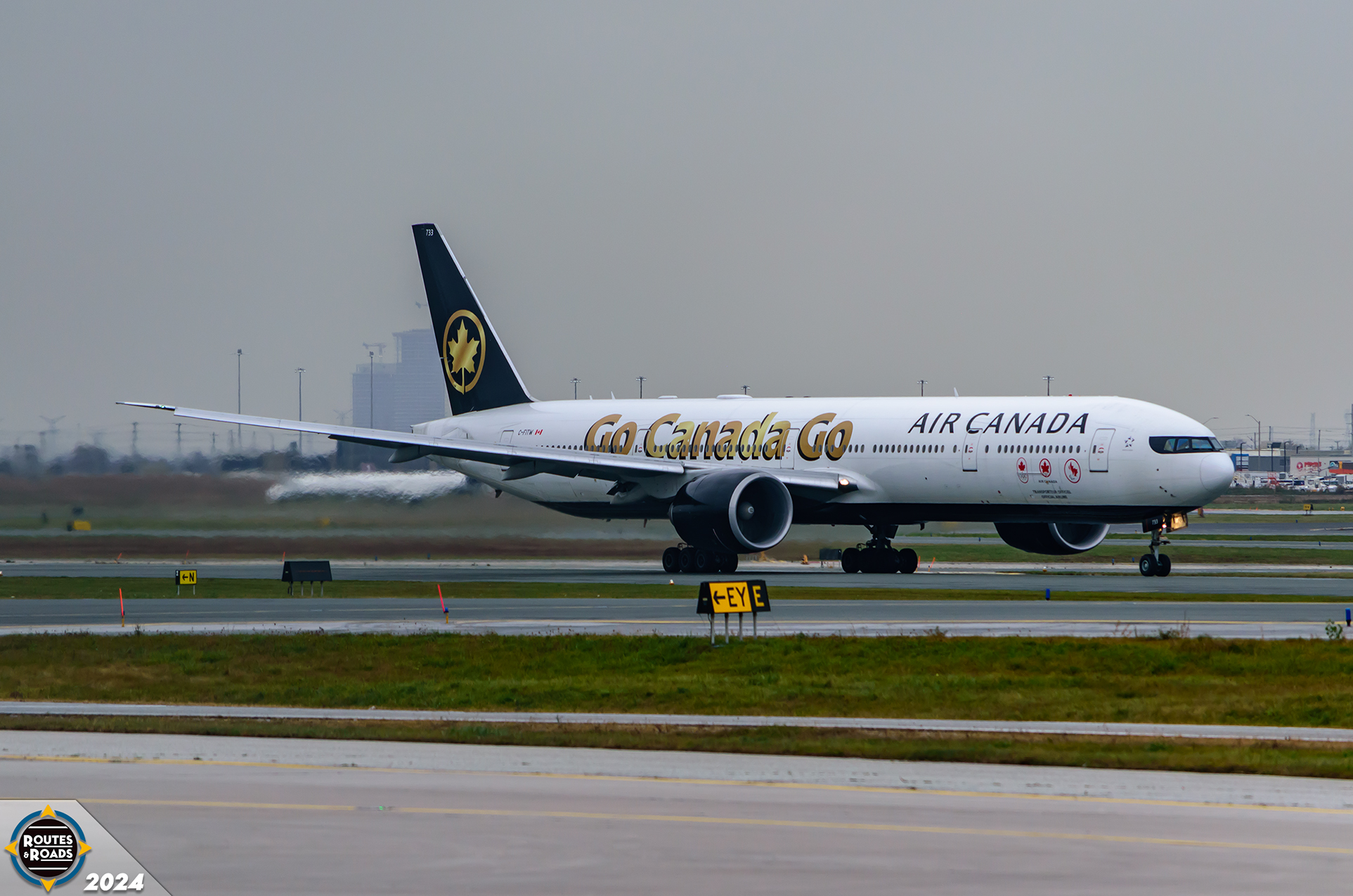 Air Canada 2007 Boeing 777-300ER C-FITW sporting the Go Canada Go Olympic livery.