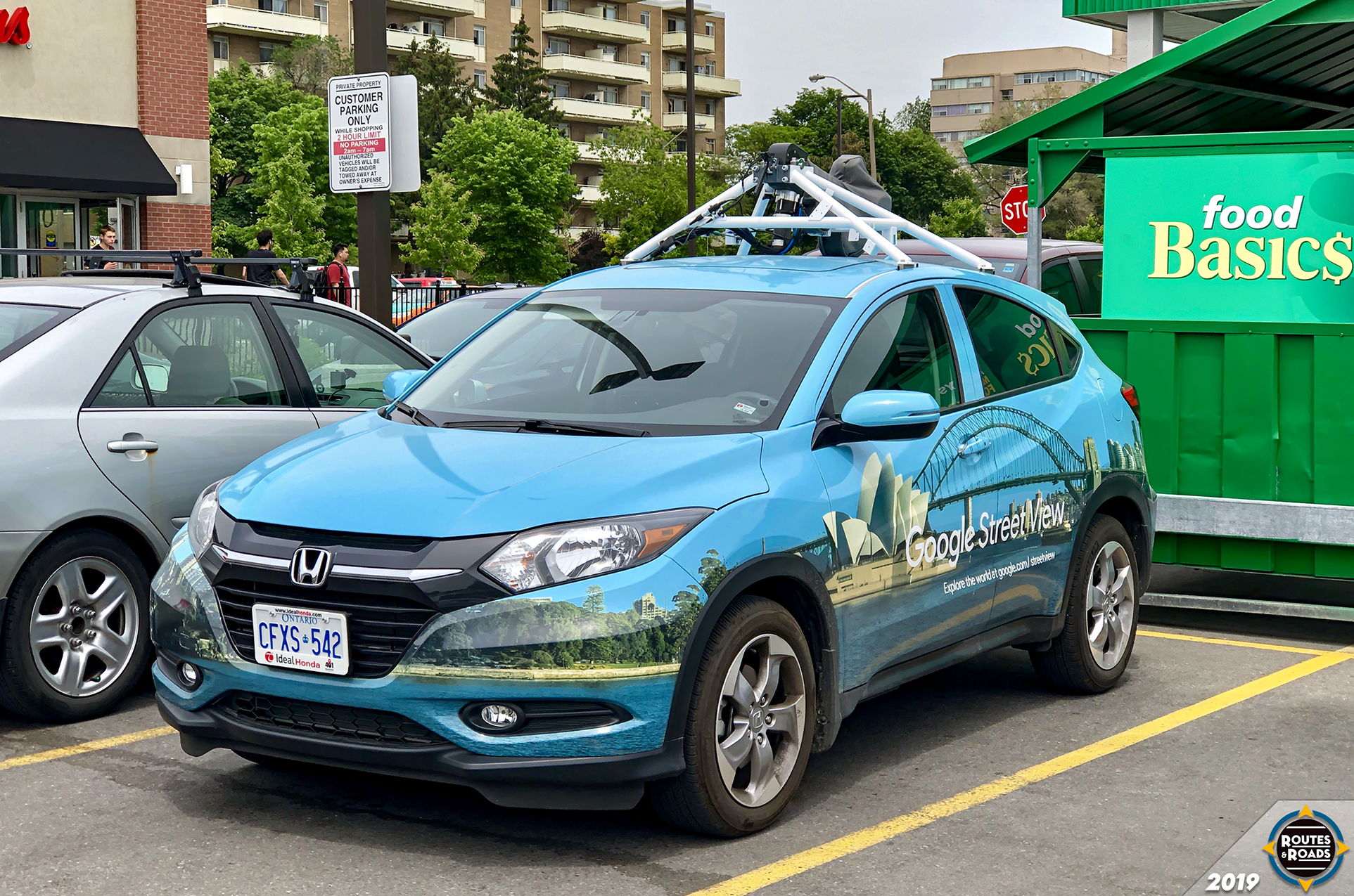 A Google Street View camera car spotted taking a break at a suburban shopping plaza in Toronto.