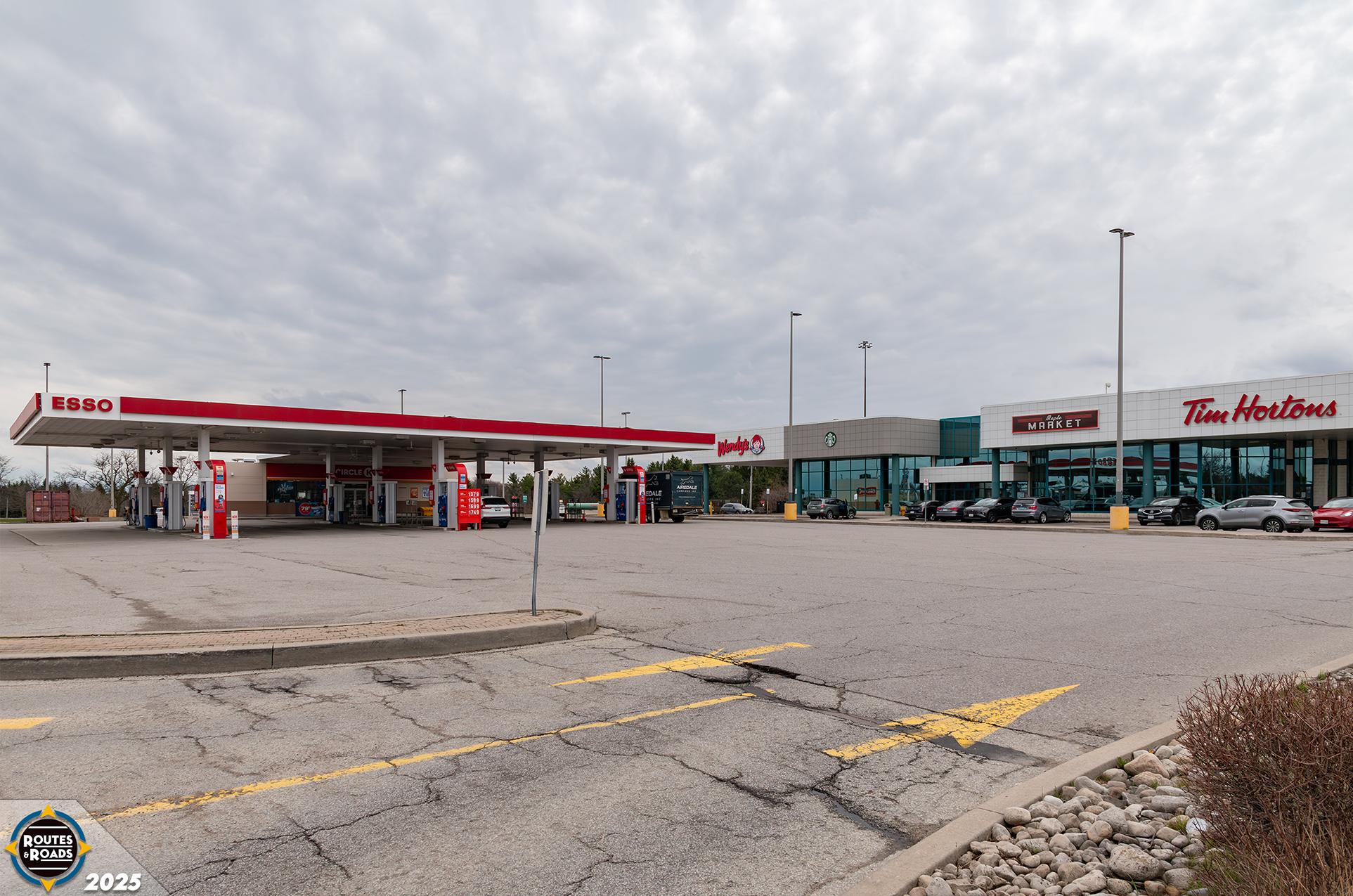 Prior to renovation, an Esso gas station accompanied amenities and fast-food restaurants at the only remaining vintage service centre on Ontario Highway 400.